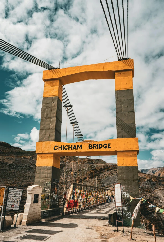 Chicham Bridge in Spiti Valley, the highest suspension bridge in Asia, surrounded by Himalayan mountains